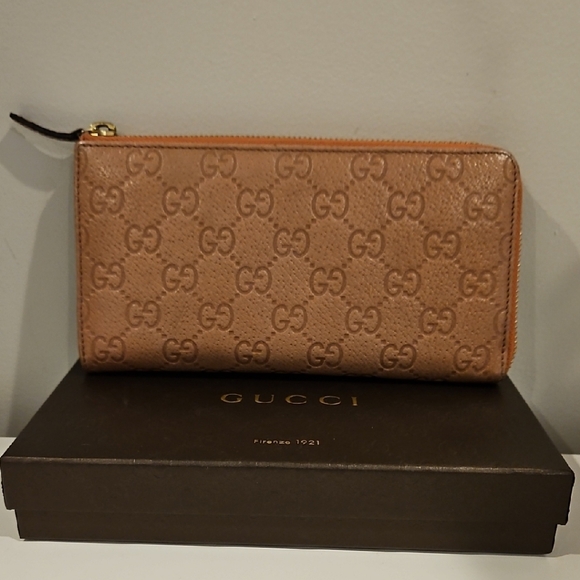 Gucci Accessories - Gucci Tan GG Embossed Wallet